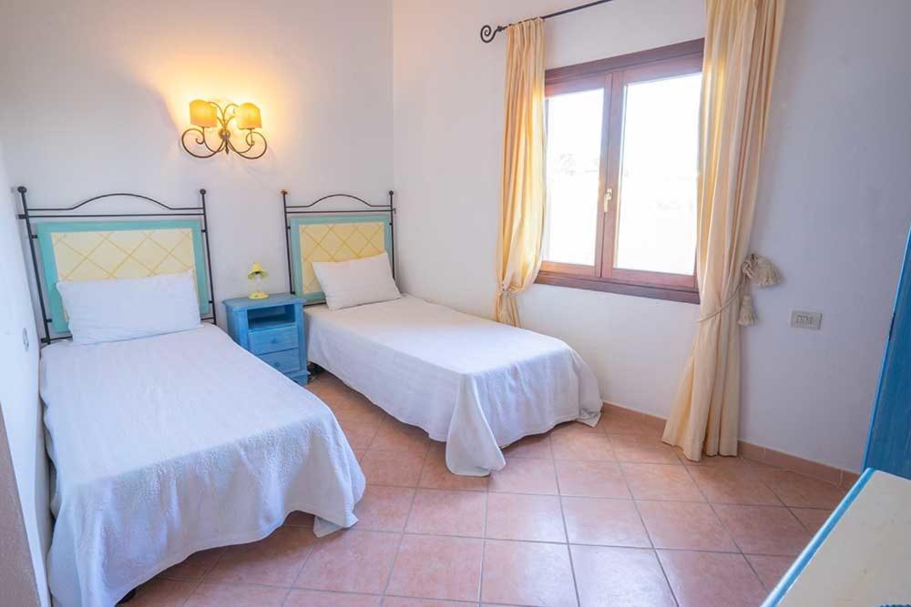Residence Baia Sant Anna Con Piscina Tanaunella Luaran gambar